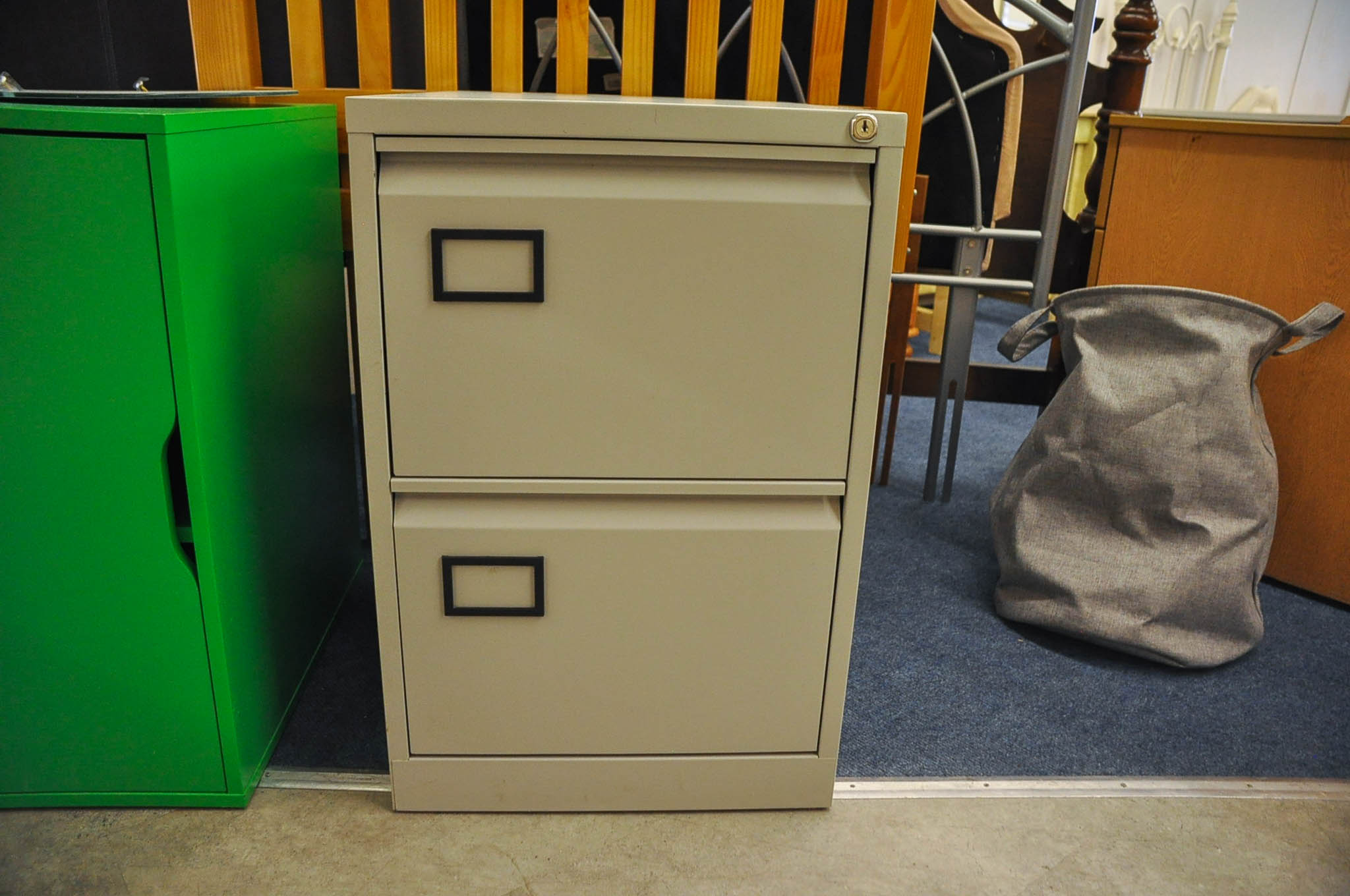2 drawer metal filing cabinet. No key.
71cm tall x 45cm wide x 61cm deep