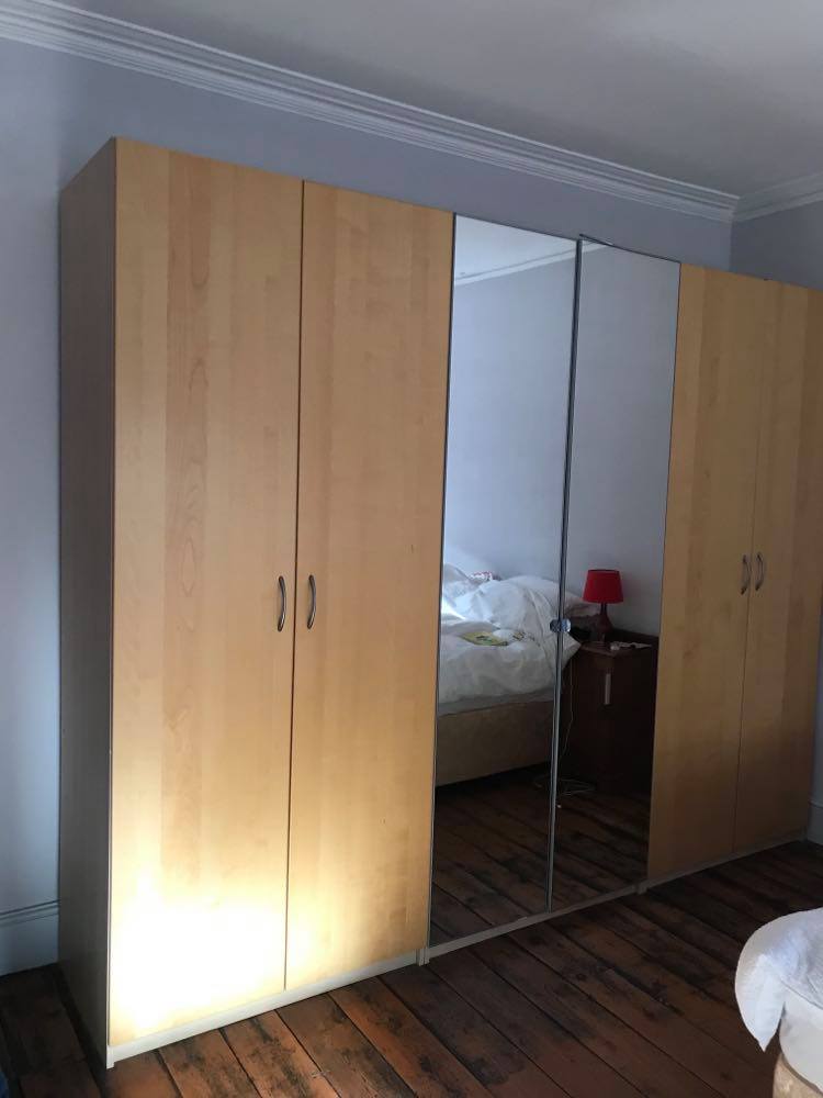 Ikea PAX Wardrobes. Very large! 240cm tall, 100cm wide, 60 cm deep. 5 available complete with drawers, shelves and hanging rails, 1 with full height mirrored doors. Dismantled for (relatively) easy transport. £100 each.