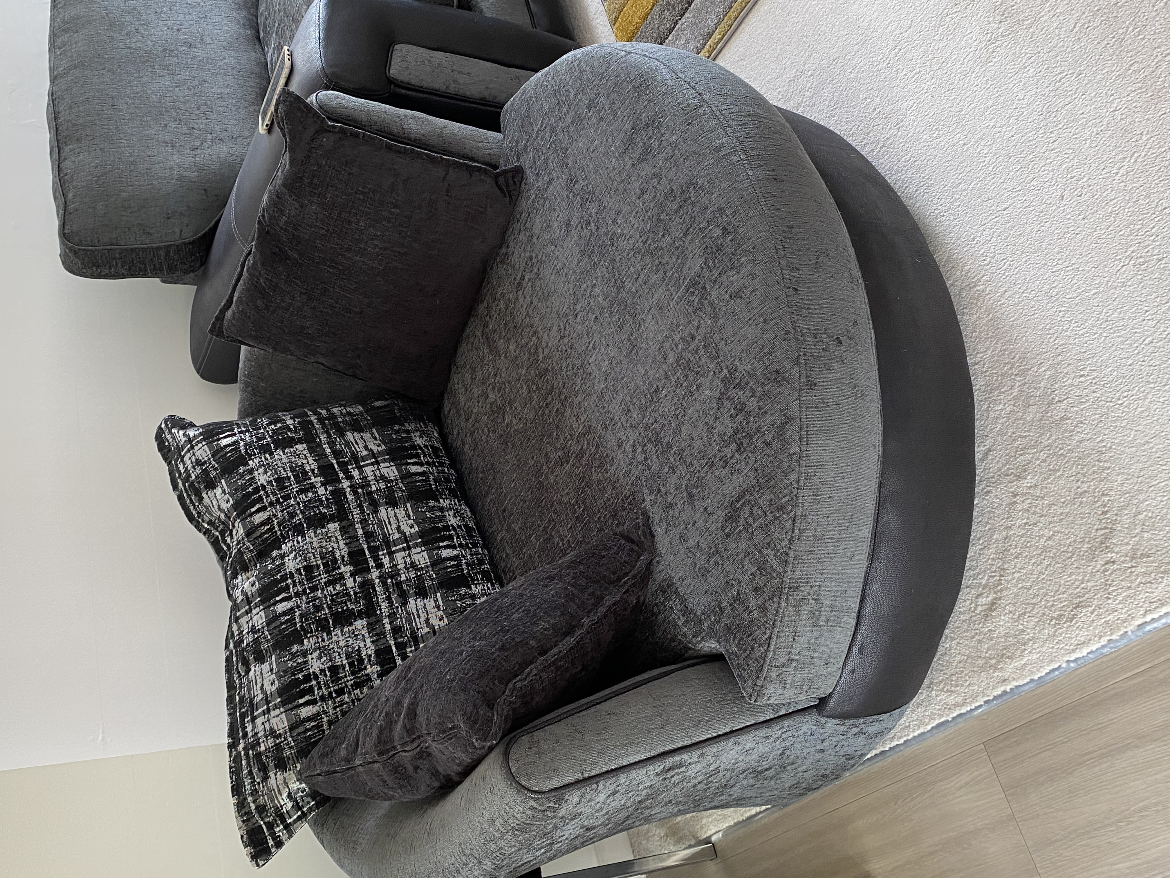 Circular, revolving "cuddle" chair, with cushions. Only 20 months old and in good condition. No longer required after recent house move.