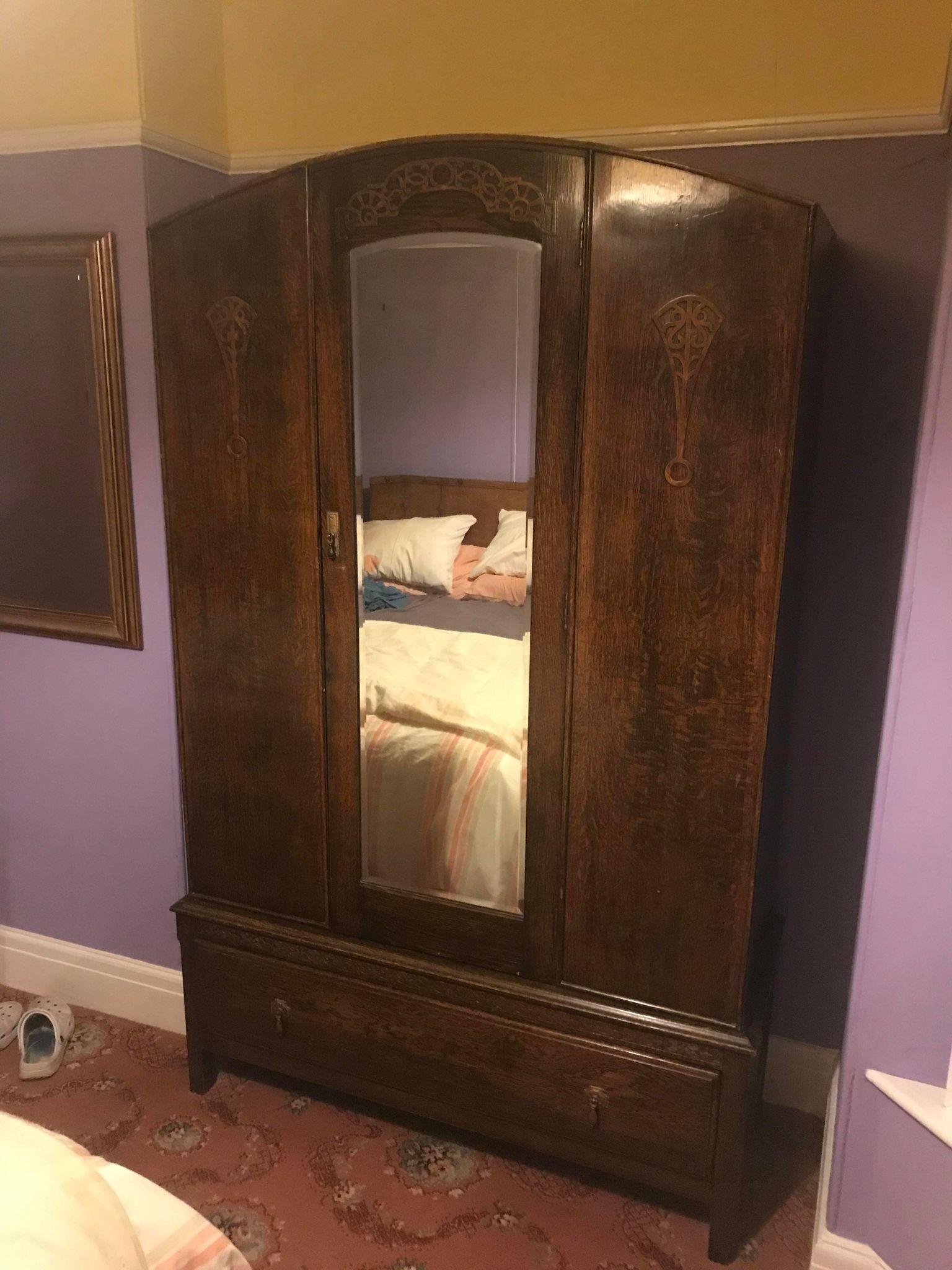 Beautiful Art Deco style wardrobe with mirrored door and carved detail. The top lifts off the base for ease of transport / delivery.