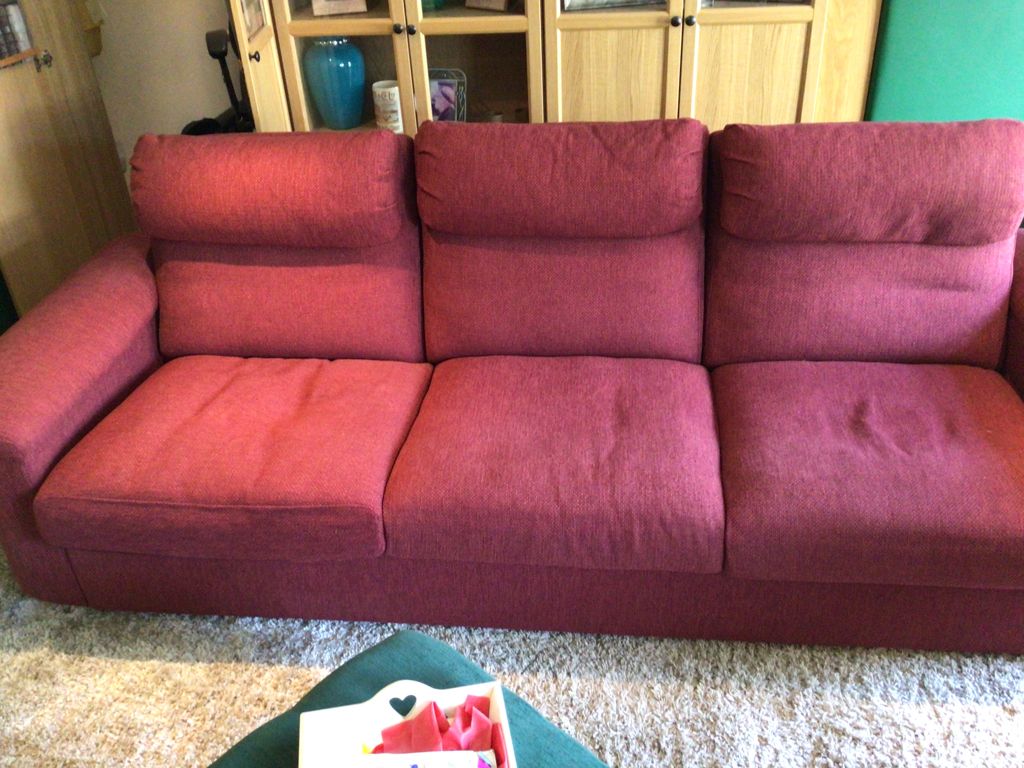 Three seater IKEA, Lidhult sofa with removable, washable covers in red.  Still stocked in store.
Less than 3 years old.