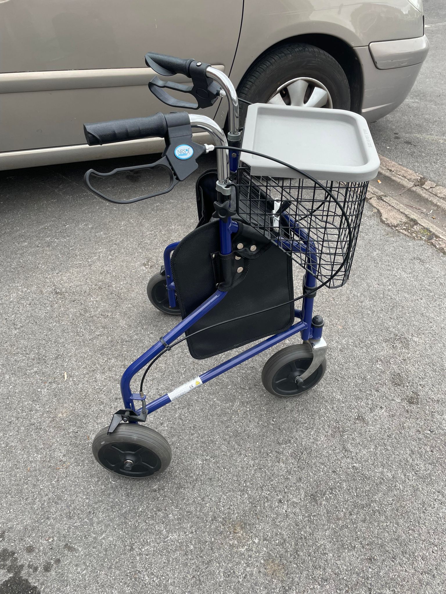 3 wheeled folding walker with basket. Virtually new!